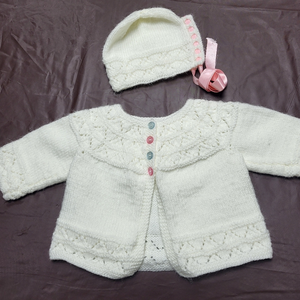 Ivory infant hand knit cardigan with matching bonnet